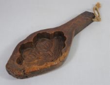 18th Century fruit wood butter mould, with a carved poppy design,