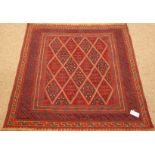 Tribal gazak red and blue ground rug,