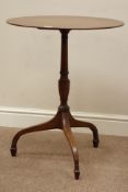 George III mahogany oval wine table, on turned column, three splayed legs with spade feet,