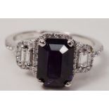 Purple sapphire and diamond cluster white gold ring hallmarked 18ct (sapphire approx 2.