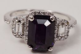 Purple sapphire and diamond cluster white gold ring hallmarked 18ct (sapphire approx 2.