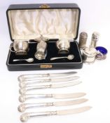 Six hallmarked silver handled pistol handle butter knifes and various silver cruet pieces