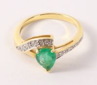Tear drop Emerald and diamond crossover hallmarked 18ct ring Condition Report