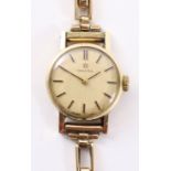 Ladies Omega 9ct gold wristwatch stamped 375 on hallmarked 9ct gold bracelet approx 13.