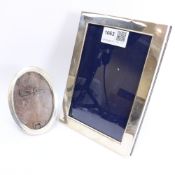 Modern silver photo frame and an small oval silver picture frame hallmarked (2) Condition