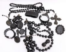 Victorian and later Whitby jet cross pendant,