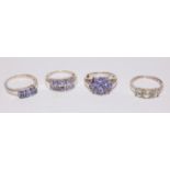 Four multi-stone set dress rings stamped 925 Condition Report <a href='//www.