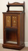 Edwardian rosewood music cabinet, enclosed by panelled and glazed door,
