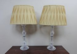 Pair of contemporary table lamps with glass bases,