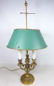 Early 20th Century gilt metal three branch candlestick style table lamp,