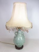Oriental Celadon type table lamp elephant head handles and floral motif,