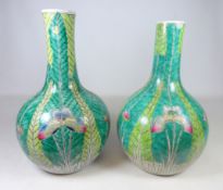 Two Chinese bottle vases with cabbage leaf and butterfly decoration,
