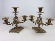 Pair of Victorian brass three light two branch candelabra, on lozenge shaped bases, with RD.