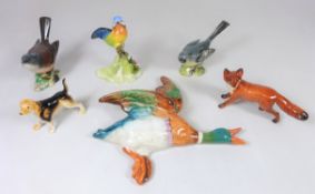 Four Beswick animals; wall mounted Mallard, two birds and fox,