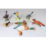 Four Beswick animals; wall mounted Mallard, two birds and fox,