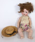 Bisque head doll with composite body and sleeping eyes, impressed 300.