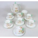 1930's Shelley coffee set for six, with the 'Sunrise Through Trees' pattern, Reg No.