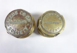 Two brass hub caps; 'J.