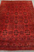 Afghan red ground rug carpet, 290cm x 202cm Condition Report <a href='//www.