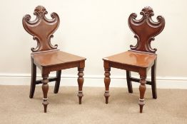 Pair William IV carved shield back hall chairs,