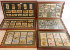 Set of four framed 'Game Birds and Wild Fowl' reproduction cigarette cards,