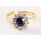 Sapphire and diamond cluster ring stamped 18ct Condition Report <a href='//www.