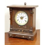 Early 20th century oak cased mantel clock, white enamel dial signed 'attorini & Sons Bradford',