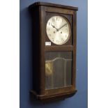 Early 20th century stained beech case wall hanging clock, twin train movement,
