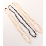Three freshwater pearl necklaces, pink and grey Condition Report <a href='//www.