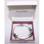 Pandora silver bracelet with eight charms and spacers stamped ALE 925 boxed Condition