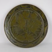 David Eeles born 1933 studio pottery stoneware charger, decorated with foliage,