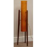 1960s floor standing 'Rocket Lamp', three tapering teak legs, with two tone fibreglass shade,