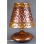 1970's hand made copper table lamp with bulbous body and tapering shade,