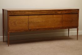 1970s rosewood sideboard, four drawers, two single cupboards and centre fall front,
