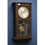 Early 20th century stain beech case wall hanging clock, twin train movement,