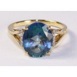 Blue Topaz ring with diamond shoulders hallmarked 9ct Condition Report <a