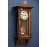 20th century oak case German wall clock, with brass detail,