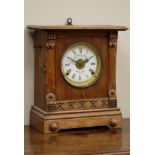 Early 20th century oak cased mantel clock, white enamel dial signed 'attorini & Sons Bradford',