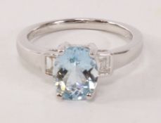 Hallmarked 18ct white gold ring set with and oval aquamarine and baguette diamonds- aqua approx 1.