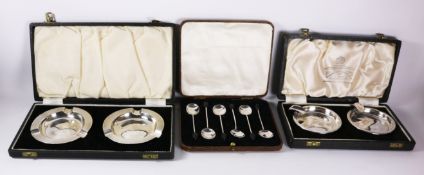 Two pairs mid 20th century hallmarked silver ashtrays and a set of six coffee bean spoons all boxed