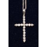 Platinum diamond set cross pendant stamped 950 on white gold chain hallmarked 18ct