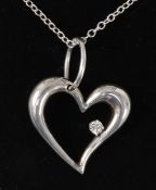 White gold heart shaped pendant set with a diamond on chain stamped 925 Condition Report