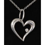 White gold heart shaped pendant set with a diamond on chain stamped 925 Condition Report