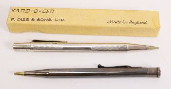 Two Yard-O-Led silver propelling pencils,