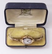 Early 20th century Swiss made 9ct gold wristwatch London 1923 on expanding Primo bracelet stamped