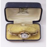 Early 20th century Swiss made 9ct gold wristwatch London 1923 on expanding Primo bracelet stamped