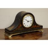 Early 20th century black lacquered chinoiserie mantle clock with raised and gilt decoration with