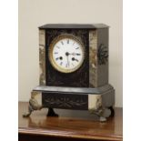 Victorian black slate and marble mantel clock, lion mask handles and cast metal claw feet,