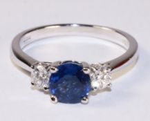 Sapphire and diamond three stone white gold ring hallmarked 18ct - sapphire approx 1.