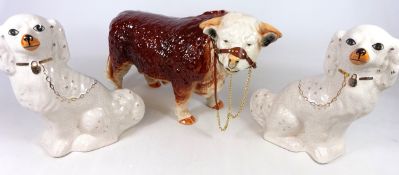 Large ceramic Staffordshire Nelson Bull model and a pair of Staffordshire type dogs (3)